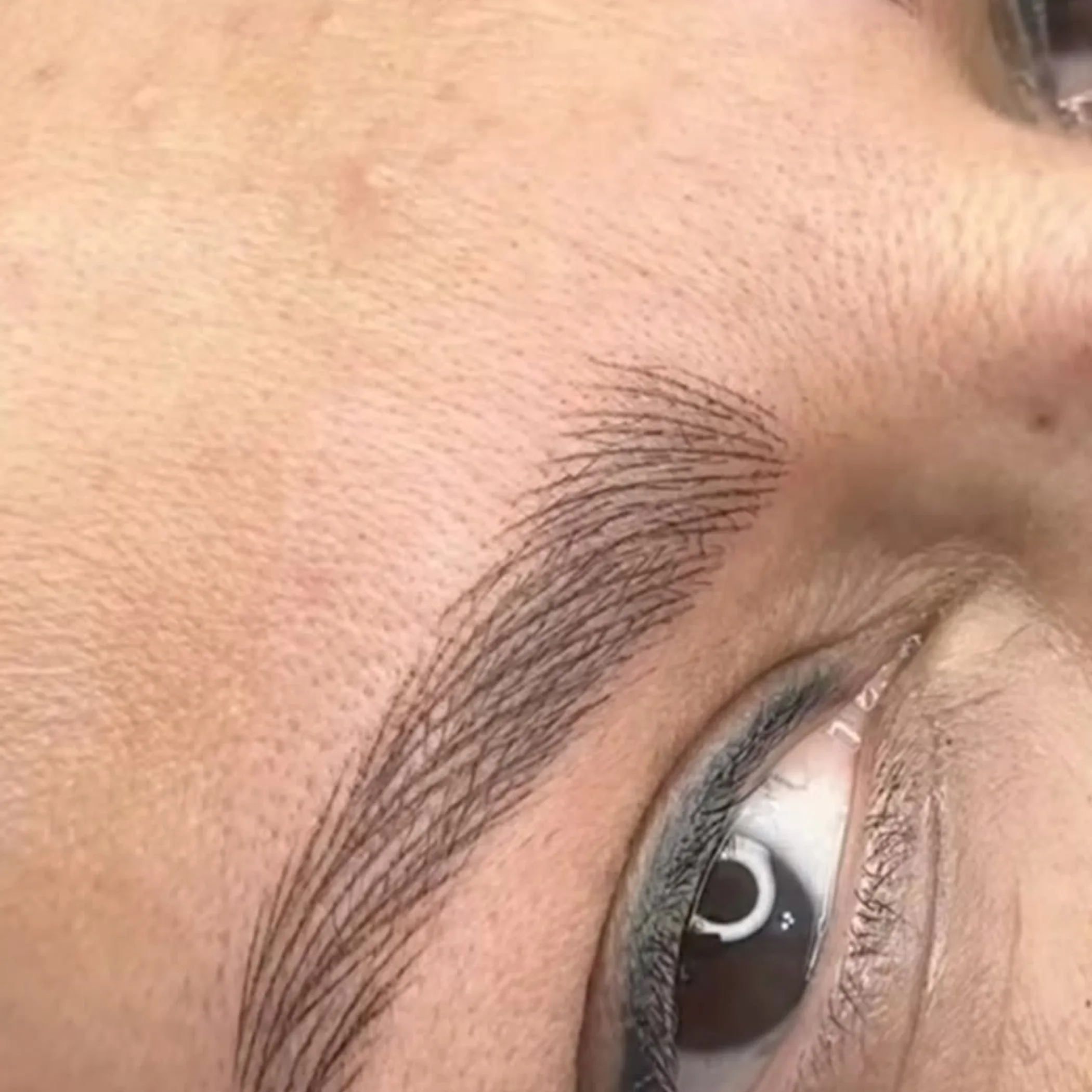 close-up of healed eyebrow tattoo