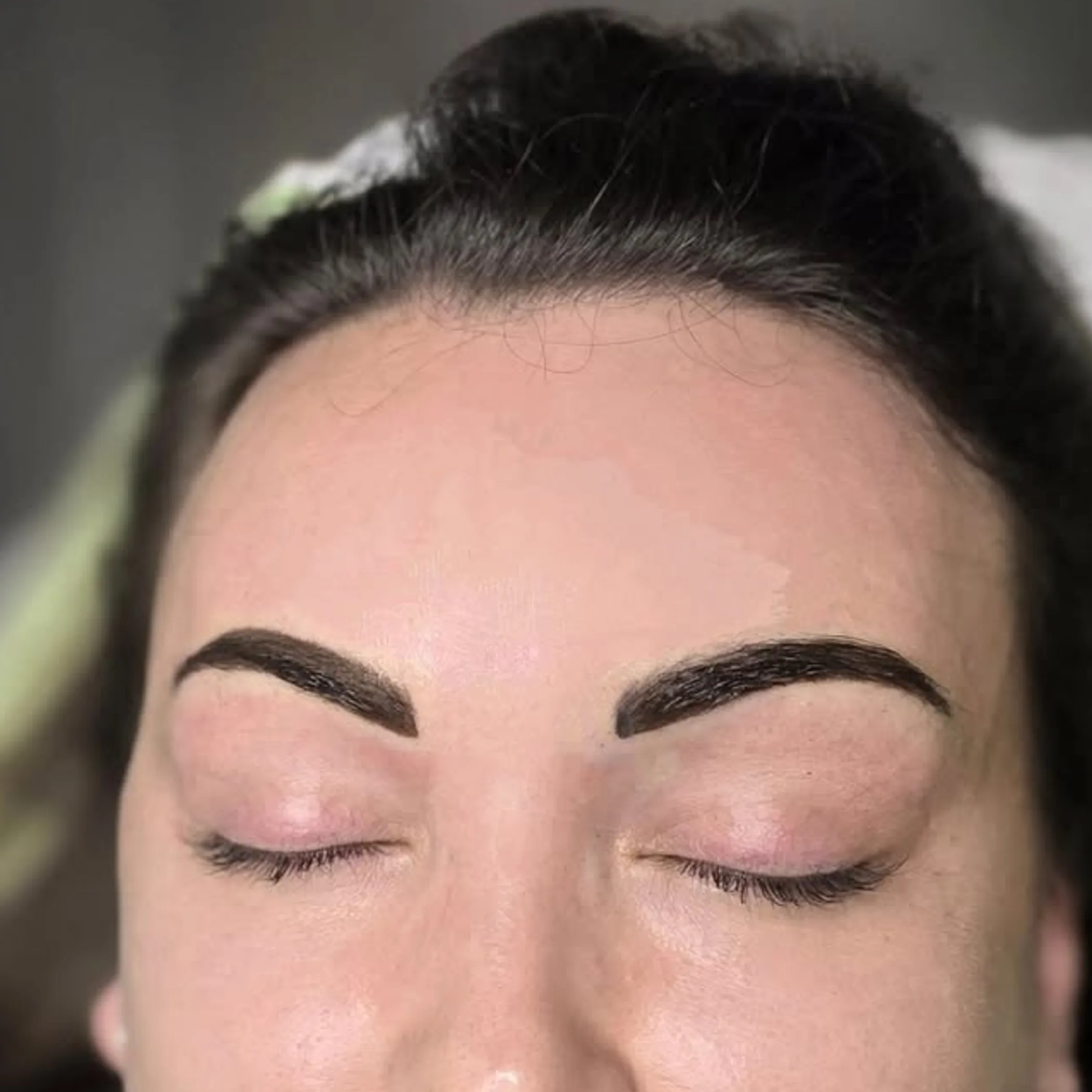 close-up of permanent eyebrow tattoo