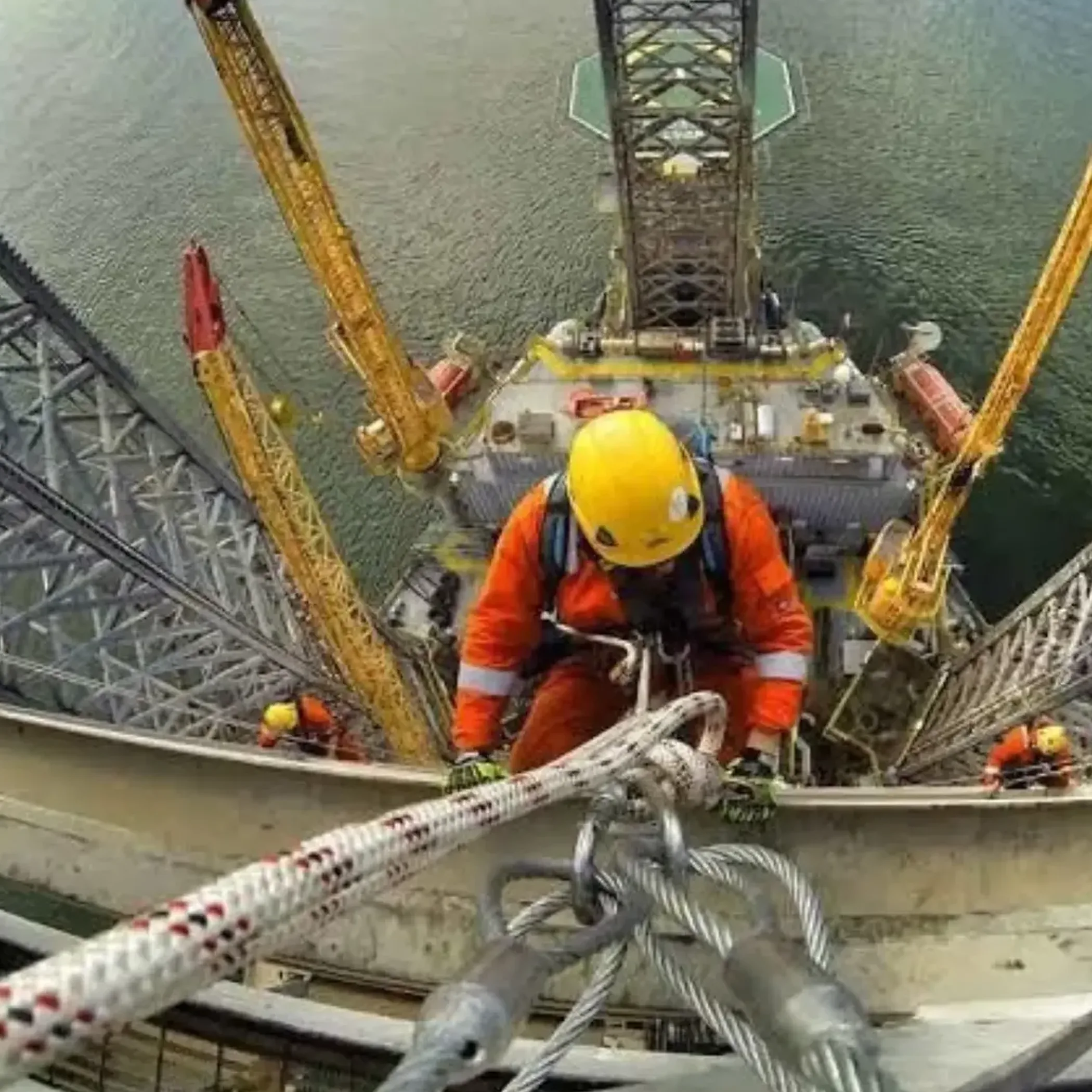 worker at height on marine structure